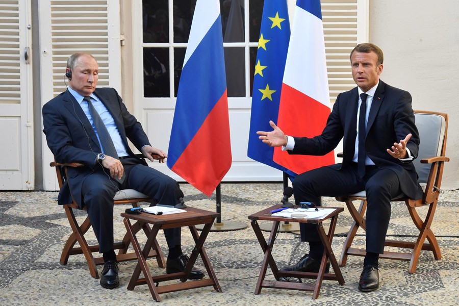 French president Emmanuel Macron meets Russia's president Vladimir Putin, at his summer retreat of the Bregancon fortress on the Mediterranean coast, near the village of Bormes-les-Mimosas, southern France, on August 19, 2019. Reuters/Files