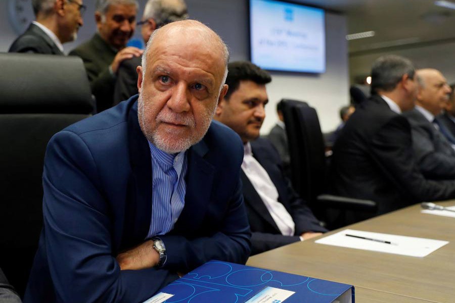 Iran's Oil Minister Bijan Zanganeh listening to journalists at the beginning of an OPEC meeting in Vienna, Austria recently 	— Reuters