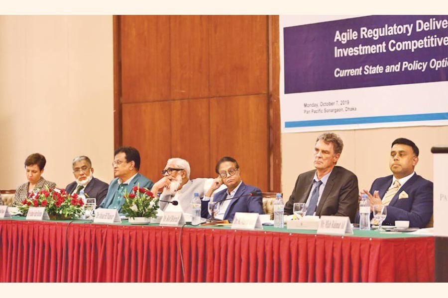 Prime Minister’s Adviser on Private Industry and Investment Salman F Rahman (4th from L) seen at the launching of a diagnostic report titled ‘Agile Regulatory Delivery for Improved Imvestment Competitiveness: Current State and Policy Options’ orgnised at a city hotel on Monday by Policy Research Institute of Bangladesh (PRI), International Finance Corporation (IFC), World Bank Group