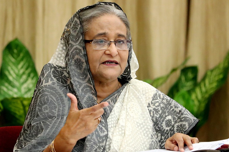 Prime Minister Sheikh Hasina addressing a press conference at her official residence Ganabhaban in Dhaka on Wednesday about the outcome of her recent official visits to New York and New Delhi — Focus Bangla photo