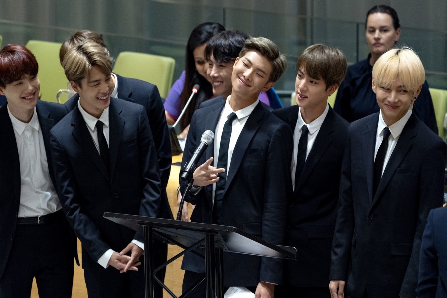 In this September 24, 2018, file photo, members of the Korean K-Pop group BTS attend a meeting at the United Nations high-level event on youth during the 73rd session of the United Nations General Assembly at UN headquarters. (AP Photo/Craig Ruttle, File)