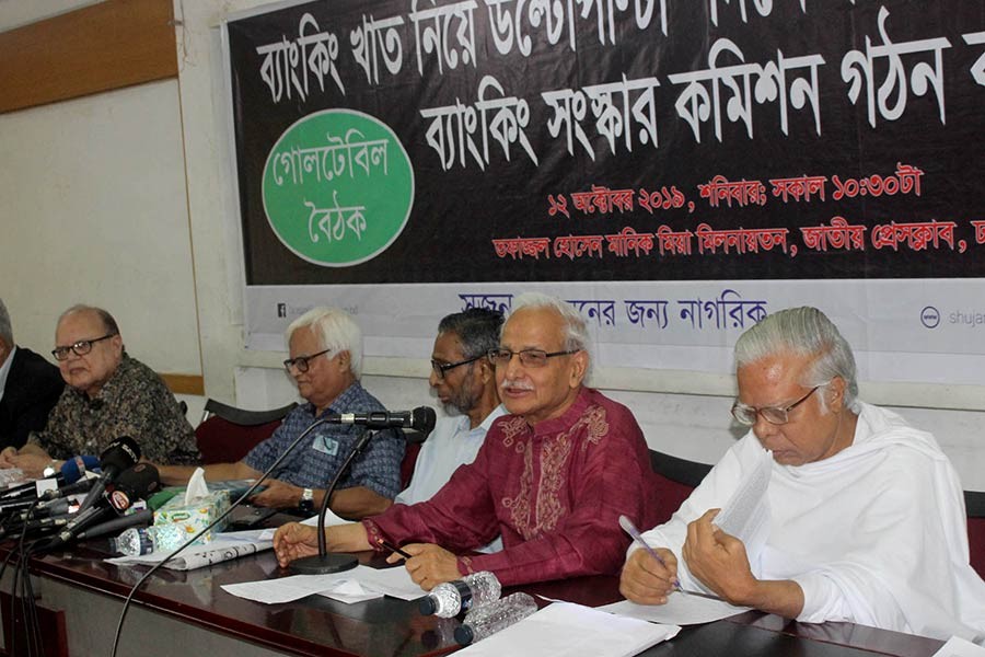 Shujan's founder secretary Dr Badiul Alam Majumder addressing a roundtable at the Jatiya Press Club on Saturday. -Focus Bangla photo