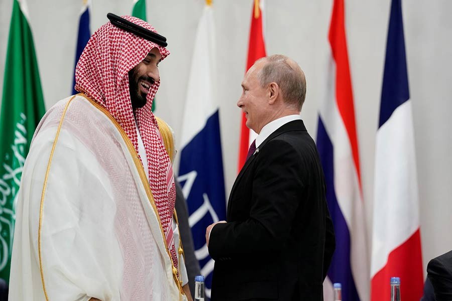 Saudi Arabia's Crown Prince Mohammed bin Salman and Russia's President Vladimir Putin speaking during a meeting at the G20 leaders summit in Osaka, Japan this year. -Reuters Photo
