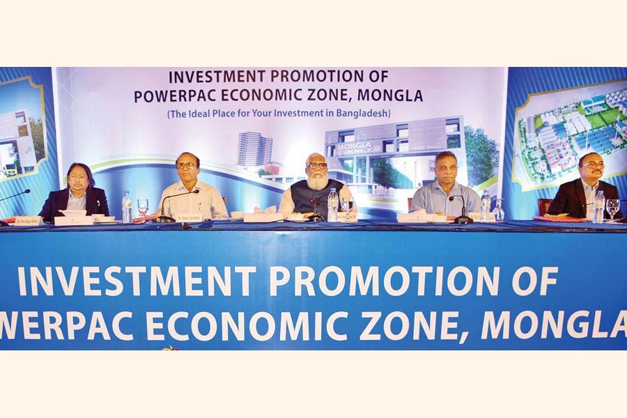 Prime Minister's Private Industry and Investment Adviser Salman F Rahman (C), Principal Coordinator of SDG Affairs at the Prime Minister's Office Md Abul Kalam Azad (2nd from R) and BEZA Executive Chairman Paban Chowdhury (2nd from L) seen at a programme 'Invest Promotion of Powerpac Economic Zone, Mongla' at a city hotel on Monday