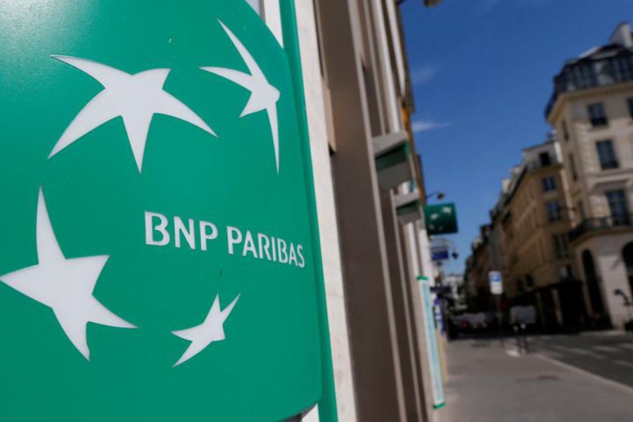 FILE PHOTO: A BNP Paribas logo is seen outside a bank office in Paris, France, August 6, 2018. REUTERS/Regis Duvignau/File Photo
