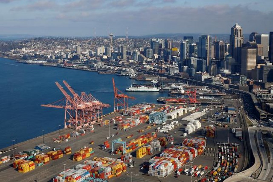 An aerial photo looking north shows shipping containers at the Port of Seattle and the Elliott Bay waterfront in Seattle, Washington, US March 21, 2019. Reuters/Files
