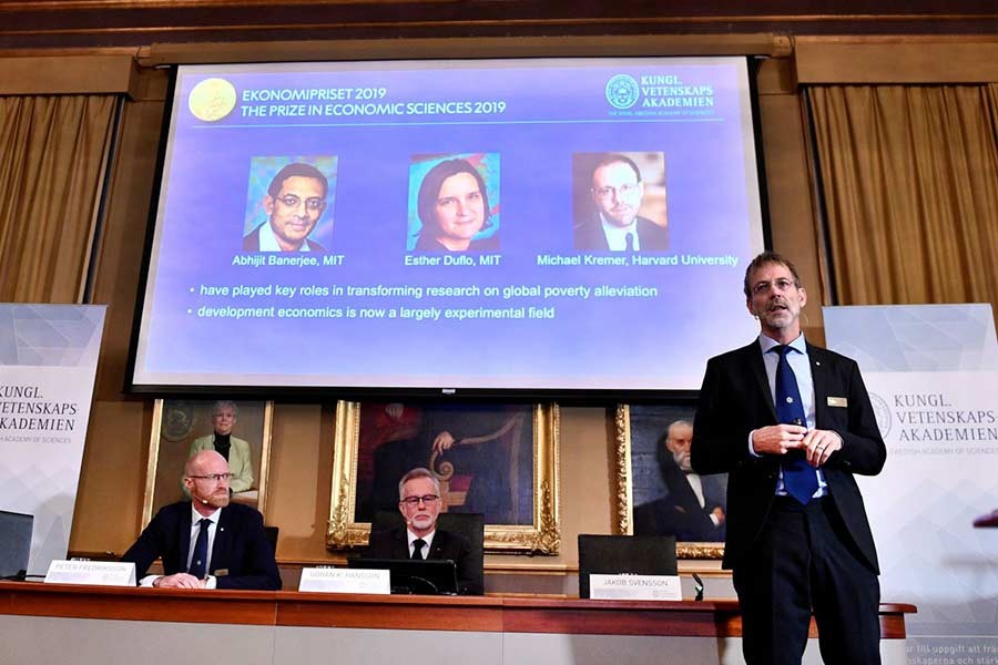 Goran K Hansson (C), Secretary General of the Royal Swedish Academy of Sciences, and academy members Peter Fredriksson (L) and Jakob Svensson, announce the winners of the 2019 Nobel Prize in Economics during a news conference at the Royal Swedish Academy of Sciences in Stockholm, Sweden, October 14, 2019. -Reuters Photo
