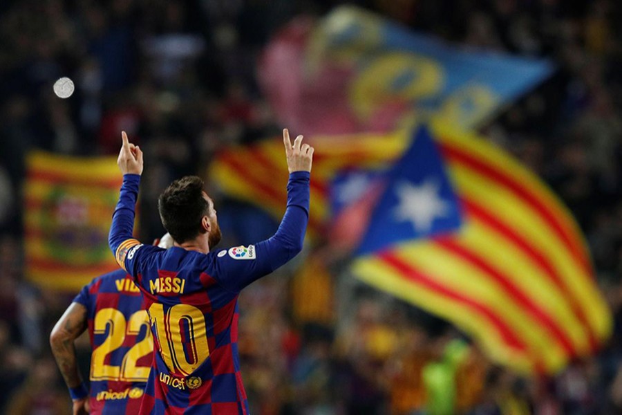 Barcelona's Lionel Messi celebrates scoring their third goal against Real Valladolid — Reuters photo