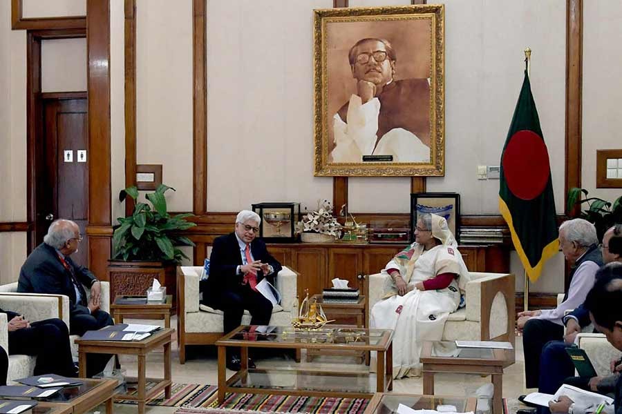 A seven-member delegation of the World Islamic Economic Forum (WIEF) and the South East Asian Cooperation (SEACO) Foundation paying a courtesy call on Prime Minister Sheikh Hasina at Ganabhaban in Dhaka on Wednesday afternoon. -PID Photo