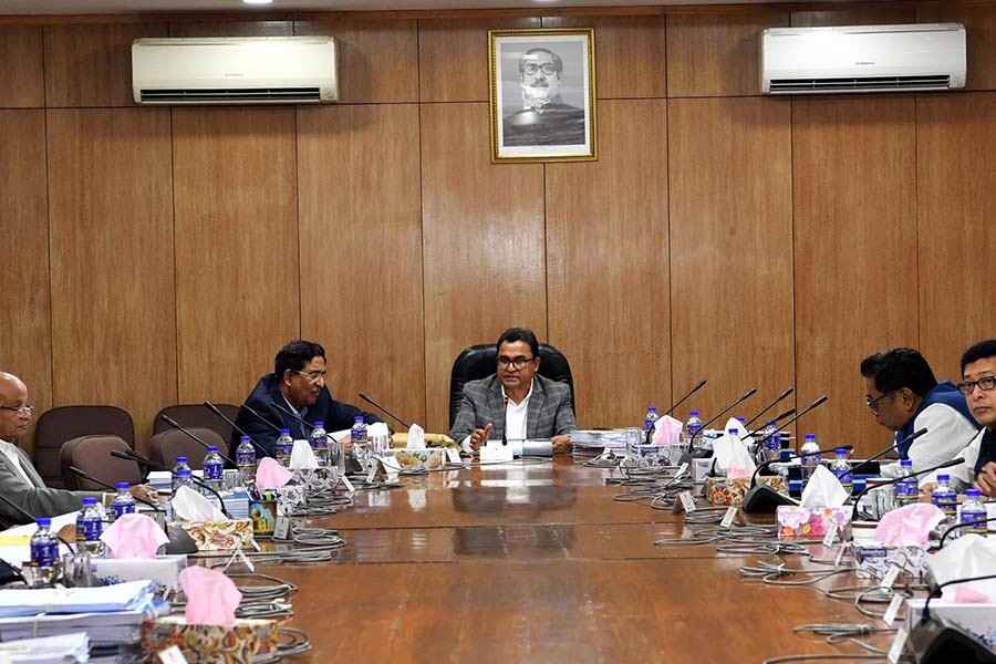 Finance Minister AHM Mustafa Kamal presiding over the meeting of Cabinet Committee on Economic Affairs at the Cabinet Division conference room on Wednesday evening. -PID Photo