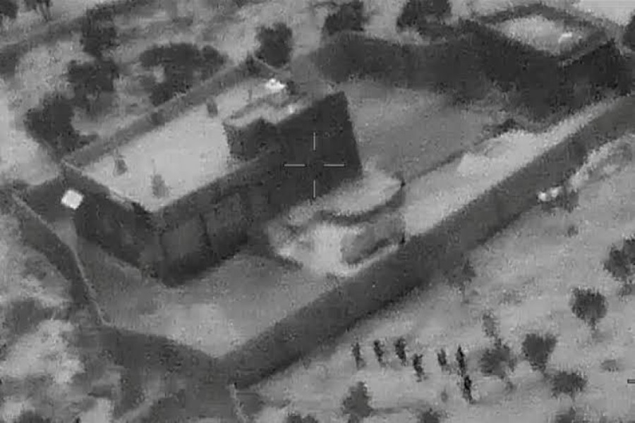 US special forces move towards the compound of Islamic State leader Abu Bakr al-Baghdadi during a raid in the Idlib region of Syria in a still image from video October 26, 2019. Video picture taken October 26, 2019. US Department of Defense/Handout via REUTERS