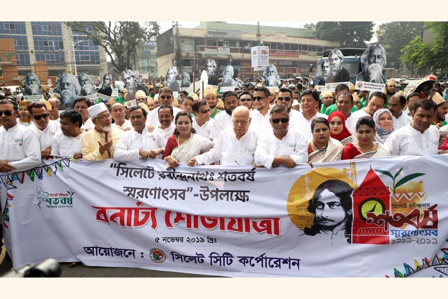 Sylhet City Corporation brought out a procession in the city on Tuesday marking 100 years of Rabindranath Tagore's Sylhet visit. Former finance minister AMA Muhith and Sylhet mayor Ariful Haque Chowdhury led the procession — FE Photo