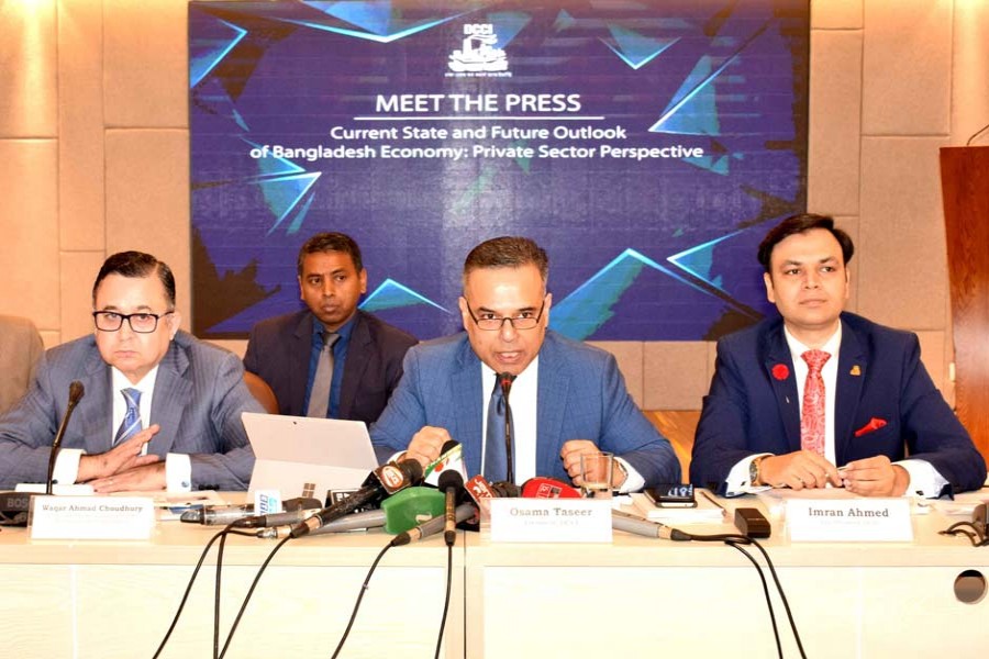 DCCI President Osama Taseer (second from right) speaking at a Meet the Press on “Current State and Future Outlook of Bangladesh Economy: Private Sector Perspective” held on November 09, 2019 at DCCI Auditorium. DCCI Senior Vice President Waqar Ahmad Choudhury (left), Vice President Imran Ahmed (right) and members of the board of directors were present during the event
