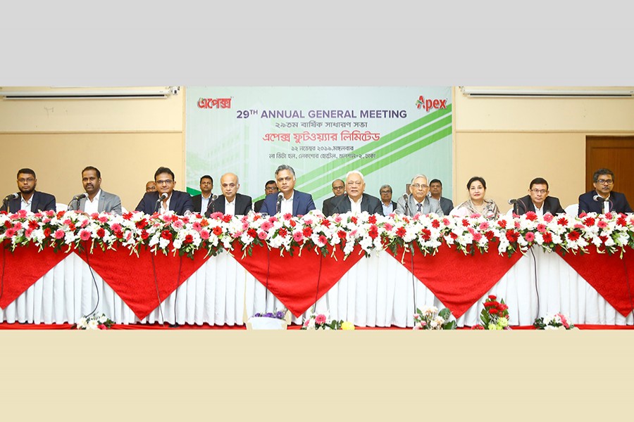 Mr Syed Manzur Elahi (fifth from right), chairperson of Apex Footwear Limited, presiding over the annual general meeting, which was also attended by Mr Syed Nasim Manzur (fifth from left), managing director, and other senior officials of the company