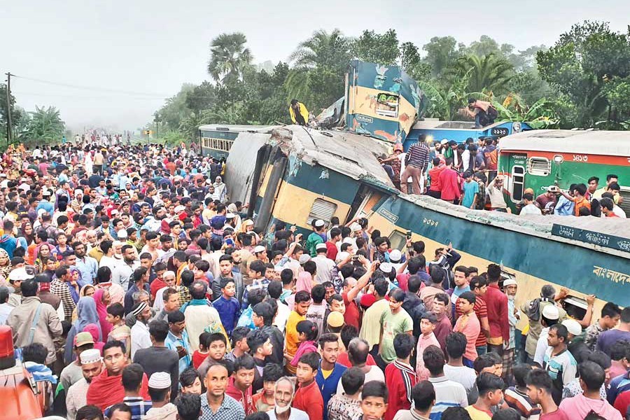 People gather around mangled wreckage of two trains that collided at a railway crossing near Mandabag Railway Station in Kasba upazila of Brahmanbaria in the early hours of Tuesday — Focus Bangla