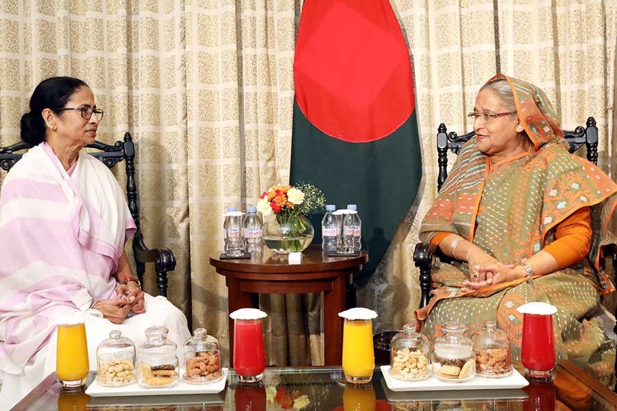 Chief Minister of India's West Bengal State Mamata Banarjee paying a courtesy call on Bangladesh Prime Minister Sheikh Hasina on Friday at a hotel in West Bengal. -PID Photo