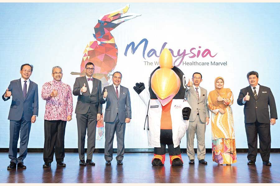 Deputy Finance Minister of Malaysia Datuk Amiruddin Hamzah (4th from left) poses with the Malaysian Healthcare Travel 2020 Mascot Dr Enggang after launching the 'Malaysian Year of Healthcare Travel 2020' at a hotel in Kuala Lumpur recently. Malaysian Healthcare Travel Council chief executive officer Sherene Azli (2nd from right) was also present