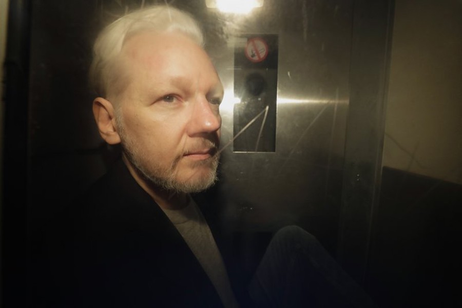 WikiLeaks founder Julian Assange is taken from court in London — AP/Files
