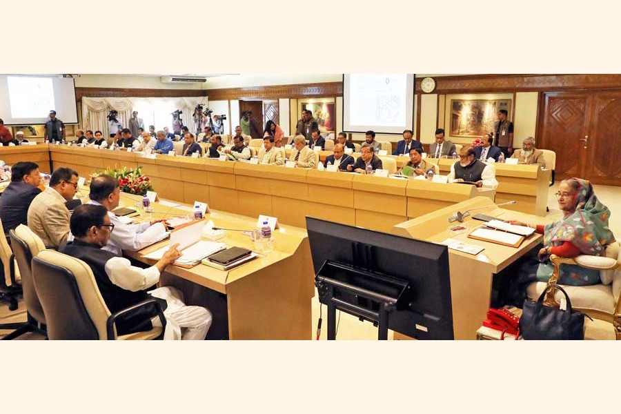 Prime Minister Sheikh Hasina presiding over the Cabinet meeting at her office in the city on Monday 	—- BSS