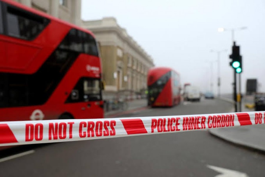 Police cordon is seen at the scene of a stabbing on London Bridge, in which two people were killed, in London, Britain, November 30, 2019. REUTERS/Simon Dawson