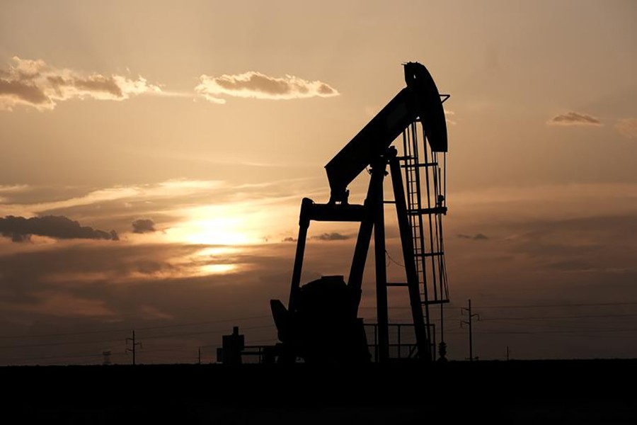 Oil pump jacks at sunset near Midland, Texas, US, on August 21, 2019 — Reuters/Files