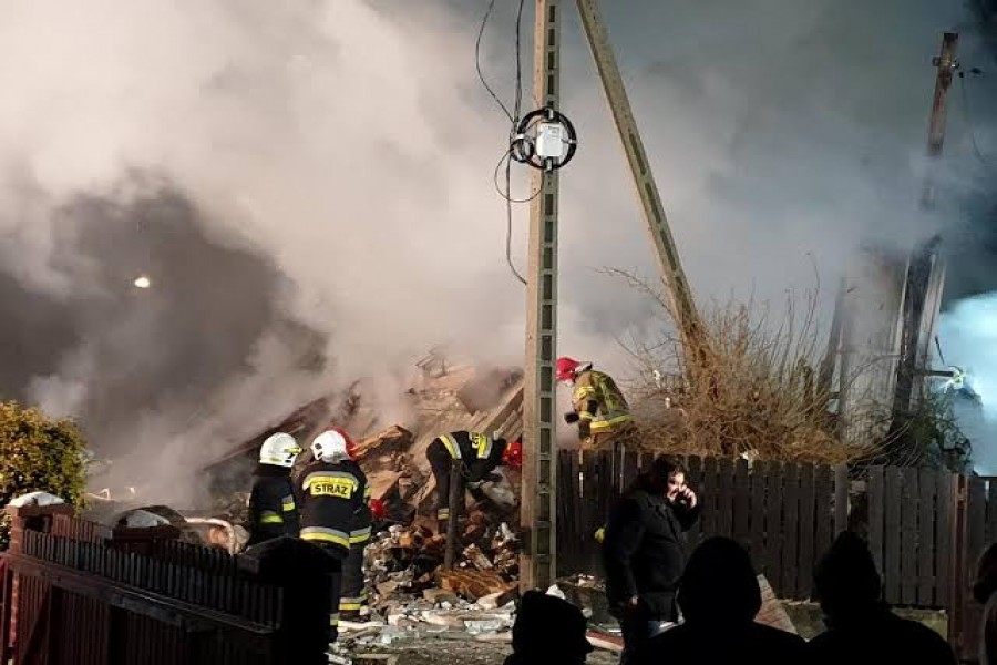 Firefighters work at the site of a building, levelled by a gas explosion, in the ski resort town of Szczyrk, Poland December 4, 2019 in this image obtained from social media. Radio Bielsko via REUTERS