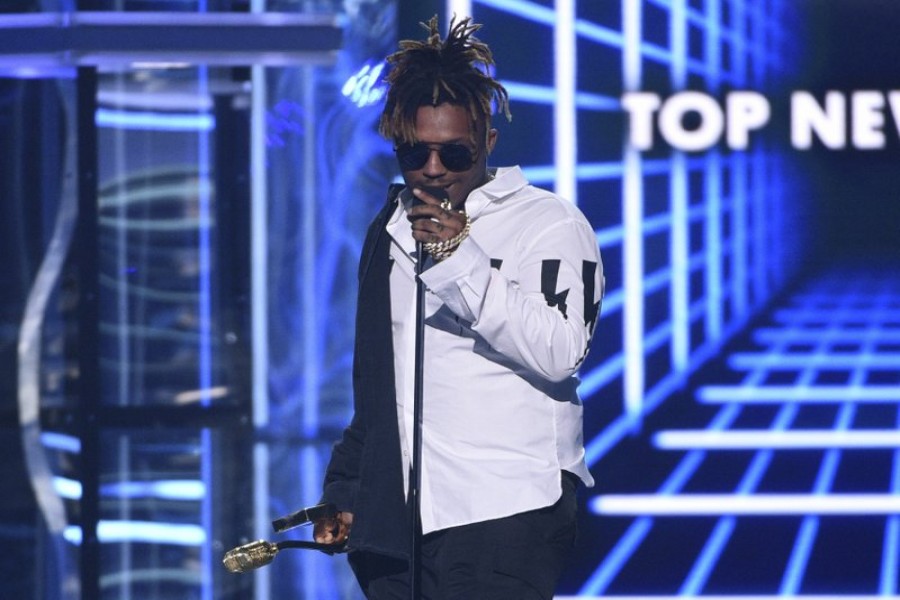 In this May 1, 2019 file photo, Juice WRLD accepts the award for top new artist at the Billboard Music Awards at the MGM Grand Garden Arena in Las Vegas - Photo by Chris Pizzello/Invision/AP, File