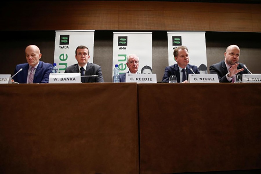 WADA Director, Intelligence and Investigations, Gunter Younger, WADA President-Elect, Witold Banka, WADA President, Sir Craig Reedie, WADA Director General, Olivier Niggli and Chair of the CRC, Jonathan Taylor QC attend a news conference after World Anti-Doping Agency's extraordinary Executive Committee (ExCo) meeting that has banned Russian athletes from all major sporting events in the next four years, in Lausanne, Switzerland on December 9, 2019 — Reuters photo