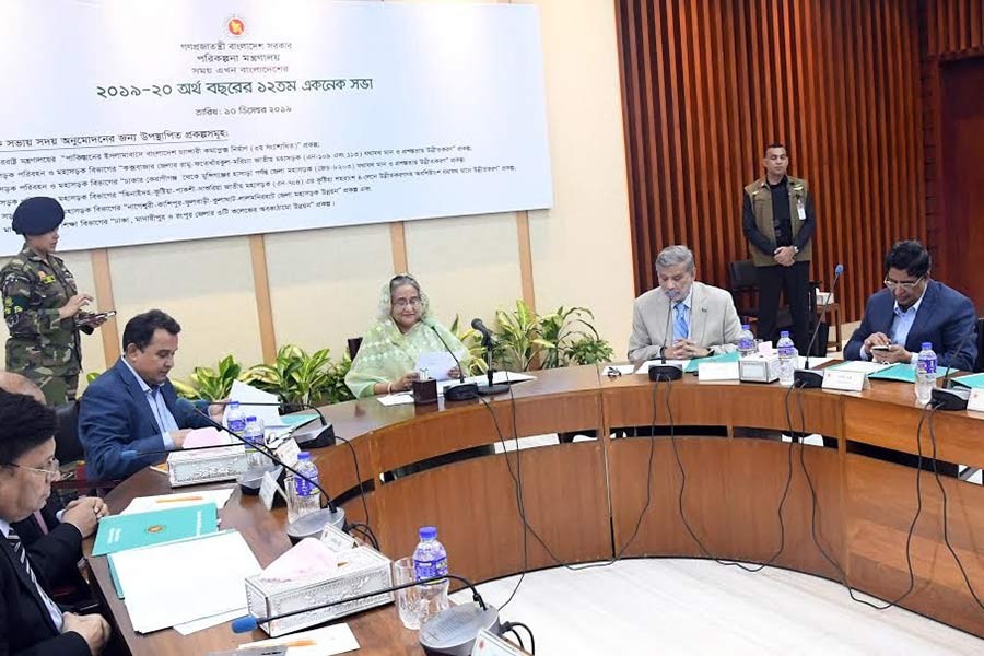 ECNEC Chairperson and Prime Minister Sheikh Hasina presiding over the 12th ECNEC meeting of the current fiscal year at the NEC Conference Room in the city’s Sher-e-Bangla Nagar area on Tuesday. -BSS Photo