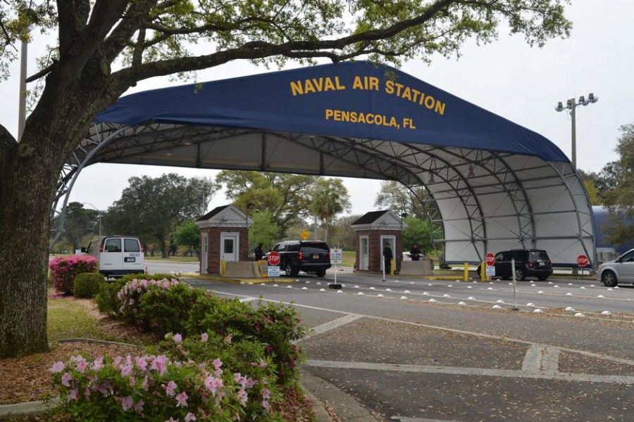 FILE PHOTO: The main gate at Naval Air Station Pensacola is seen on Navy Boulevard in Pensacola, Florida, U.S. March 16, 2016. Picture taken March 16, 2016. U.S. Navy/Patrick Nichols/Handout via REUTERS/File Photo