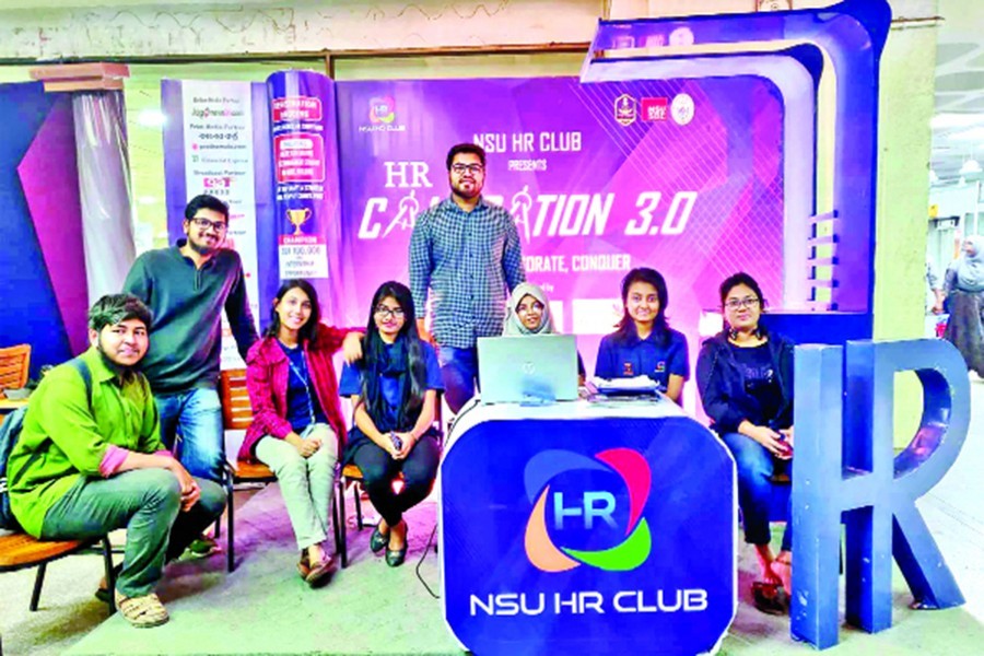 Members of North South University Human Resources club in front of the registration booth