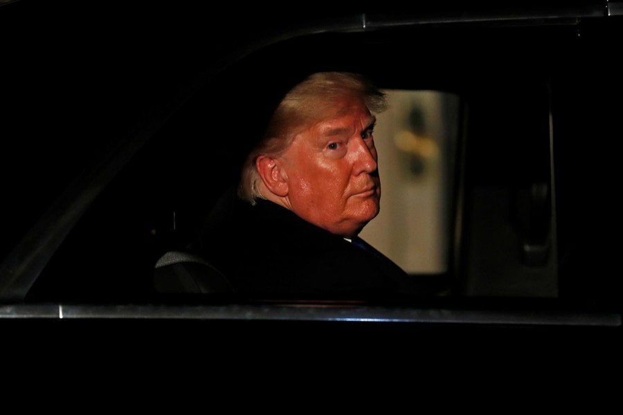 US President Donald Trump leaves Downing Street after attending a reception hosted by Britian's Prime Minister Boris Johnson, ahead of the NATO summit in Watford, in London, Britain, December 3, 2019. Alastair Grant/Pool via Reuters/File Photo