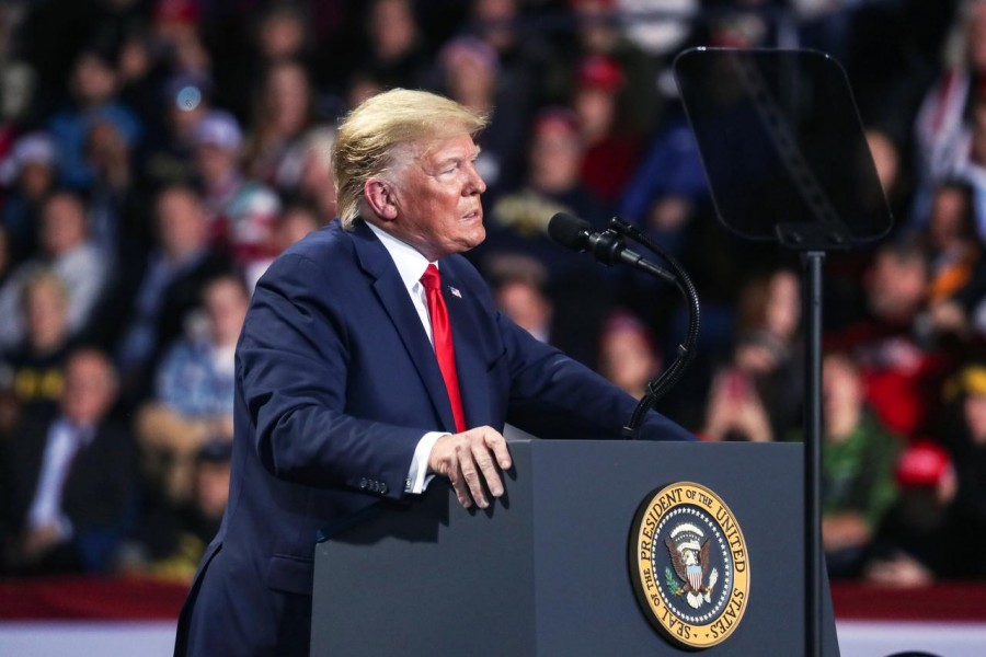 US President Donald Trump looks on during a campaign rally in Battle Creek, Michigan, US, December 18, 2019. Reuters