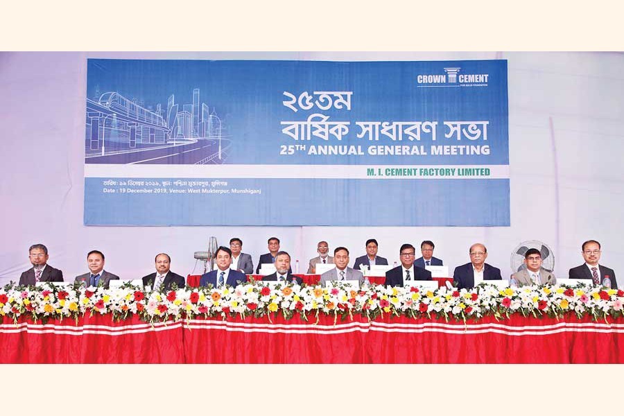 Chairman of MI Cement Mohammed Jahangir Alam (5th from right) presiding over the 25th annual general meeting (AGM) of MI Cement Factory Ltd. on the factory premises at West Mukterpur in Munshiganj on Thursday