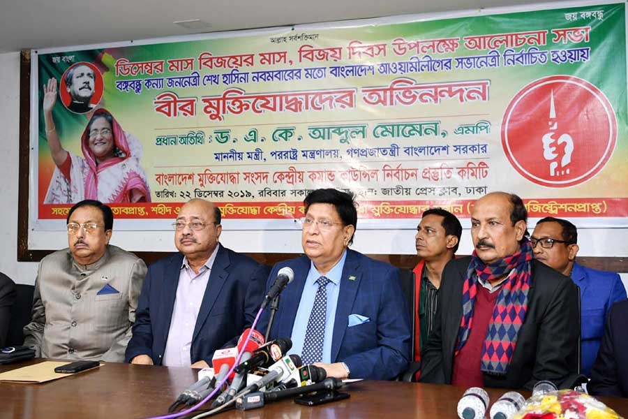 Foreign Minister Dr AK Abdul Momen addressing a meeting organised by the Bangladesh Muktijoddha Sangsad Command Council at the Jatiya Press Club on Sunday. -PID Photo