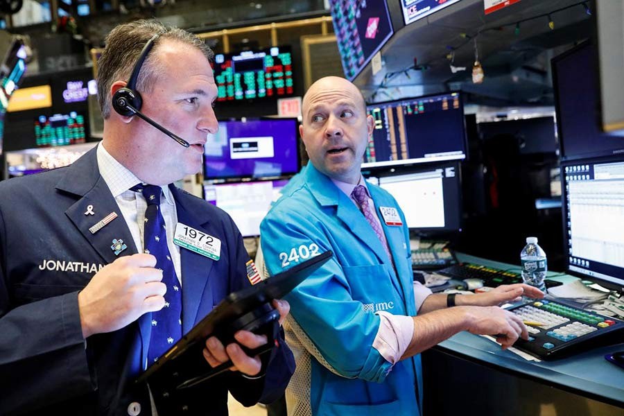 Traders working on the floor at the New York Stock Exchange (NYSE) in New York, US. The Reuters photo was taken on December 17, 2019.