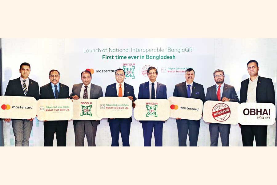 Ahmed Jamal (4th from right), Deputy Governor, Bangladesh Bank,  attended the launching ceremony as the Chief Guest.  Syed Mahbubur Rahman, Managing Director & CEO, Mutual Trust Bank Limited (MTB) and Syed Mohammad Kamal, Country Manager, Bangladesh, Mastercard, seen, among others