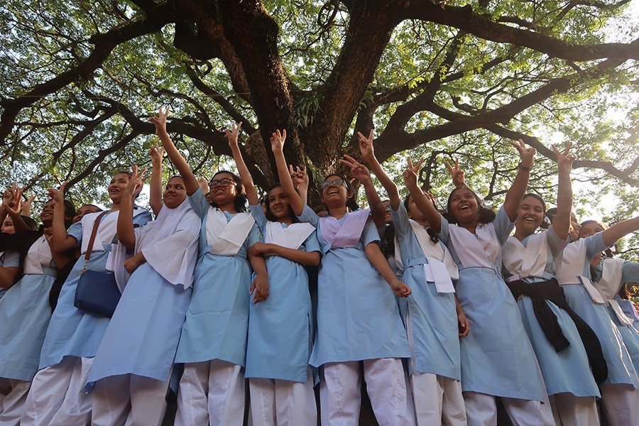 Students at a school in Dhaka cheer after the JSC exam results — FE/Files