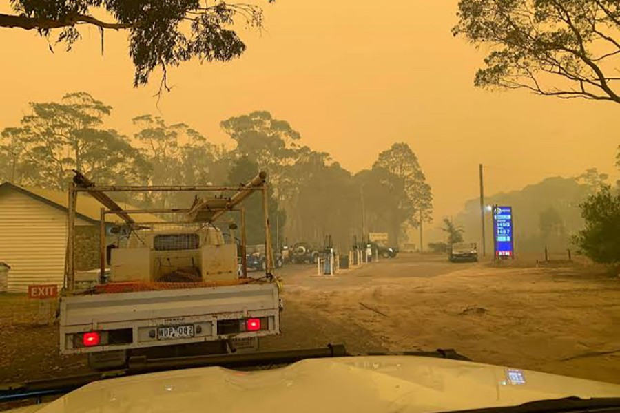 Cars queue up for petrol at a gas station in Bega Valley, New South Wales, Australia on December 31, 2019 in this picture obatained from social media — Melissa Pouliot via REUTERS