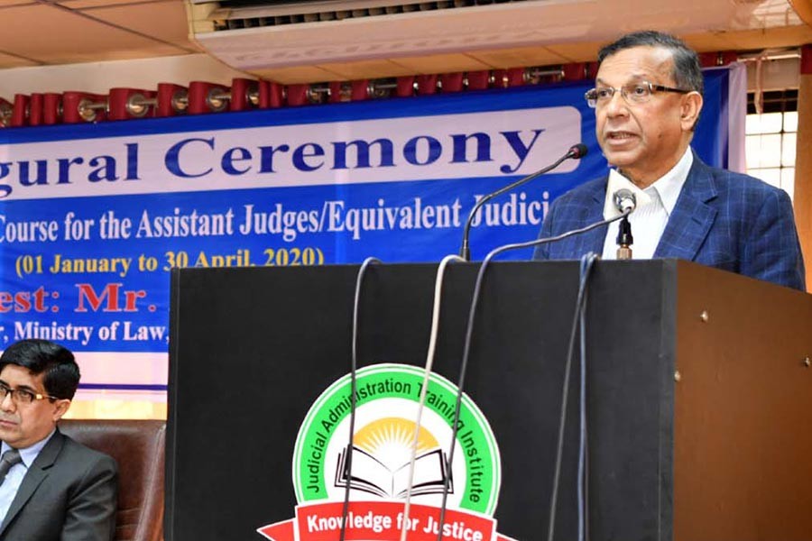 Law Minister Anisul Huq addressing the inaugural ceremony of the basic training workshop for Assistant Judges in Justice Administration Training Institute (JATI) in the capital on Wednesday. -PID Photo