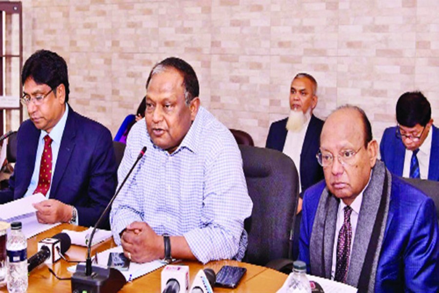 Commerce Minister Tipu Munshi (middle) speaking at the meeting on essential commodities at the commerce ministry conference room on Thursday while Chairman of the parliamentary standing committee on the Ministry of Commerce (MoC) Tofail Ahmed (right) was present