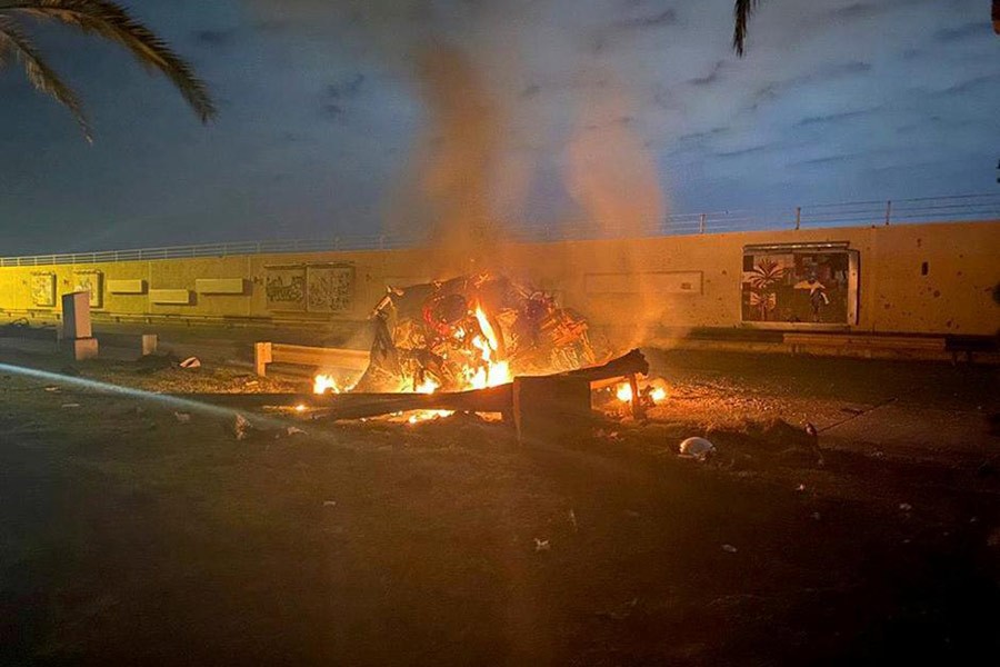 Burning debris are seen on a road near Baghdad International Airport, which according to Iraqi paramilitary groups were caused by three rockets hitting the airport in Iraq, January 3, 2020. -Reuters Photo