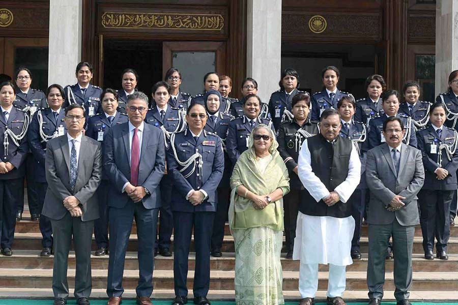 Prime Minister Sheikh Hasina, Home Minister Asaduzzaman Khan Kamal and senior police officers posing for photographs after a conference at PMO as part of the Police Week-2020 celebrations. -PID Photo