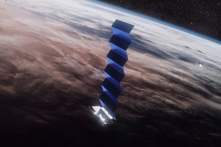 An illustration of SpaceX's Starlink satellite internet constellation in orbit around Earth - SpaceX