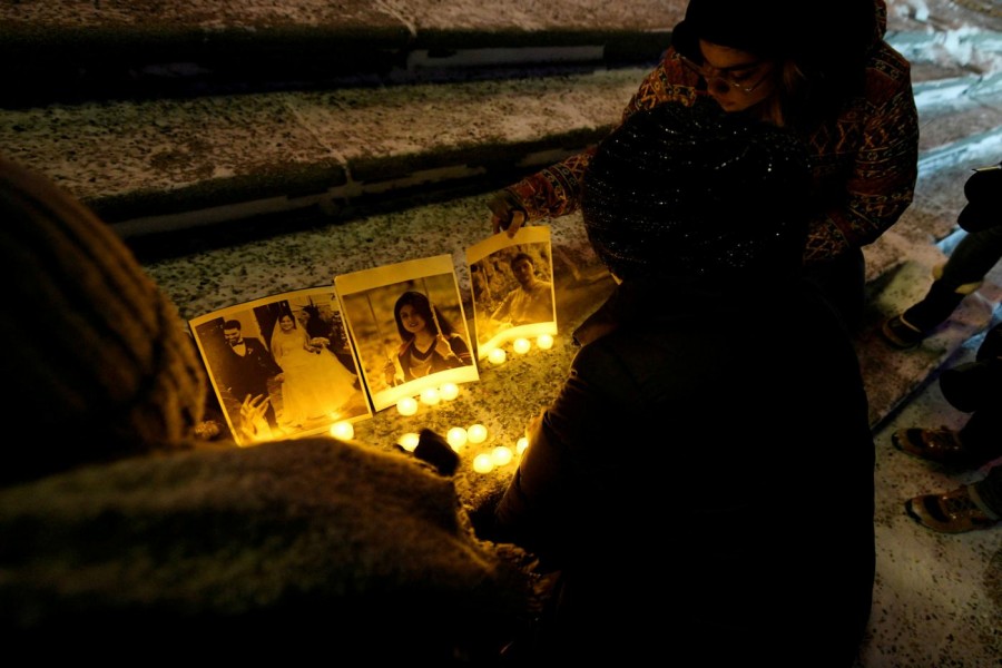 People attend a candlelight vigil held at the Edmonton Legislature building, in memory of the victims of a Ukrainian passenger plane that crashed in Iran, in Edmonton, Alberta, Canada (Reuters)