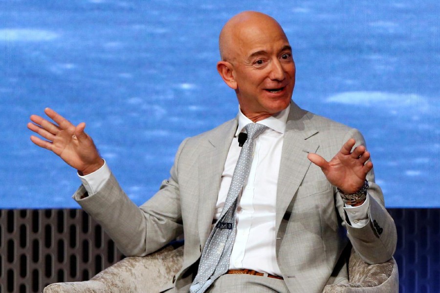 FILE PHOTO: Jeff Bezos, founder of Amazon and Blue Origin speaks at the John F. Kennedy Library in Boston, Massachusetts, U.S., June 19, 2019. REUTERS/Katherine Taylor/File Photo