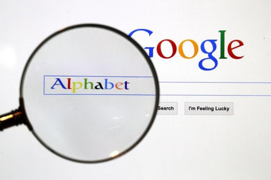 A Google search page is seen through a magnifying glass in this photo illustration taken in Berlin on August 11, 2015 — Reuters/Files
