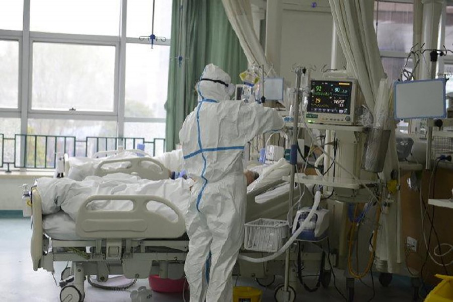A picture released by the Central Hospital of Wuhan shows medical staff attending to patient at the The Central Hospital Of Wuhan Via Weibo in Wuhan, China on an unknown date — THE CENTRAL HOSPITAL OF WUHAN VIA WEIBO/Handout via REUTERS