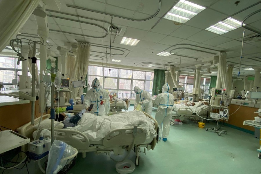 Pictures uploaded to social media on January 25, 2020 by the Central Hospital of Wuhan show medical staff attending to patients, in Wuhan, China. THE CENTRAL HOSPITAL OF WUHAN VIA WEIBO /via REUTERS