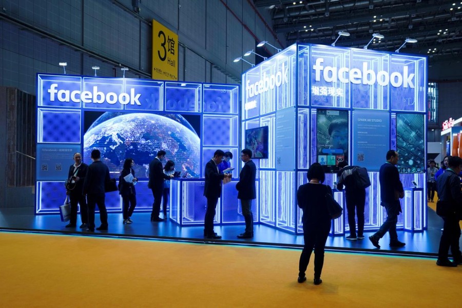 FILE PHOTO: Facebook signs are seen during the China International Import Expo (CIIE), at the National Exhibition and Convention Center in Shanghai, China November 5, 2018. REUTERS/Aly Song